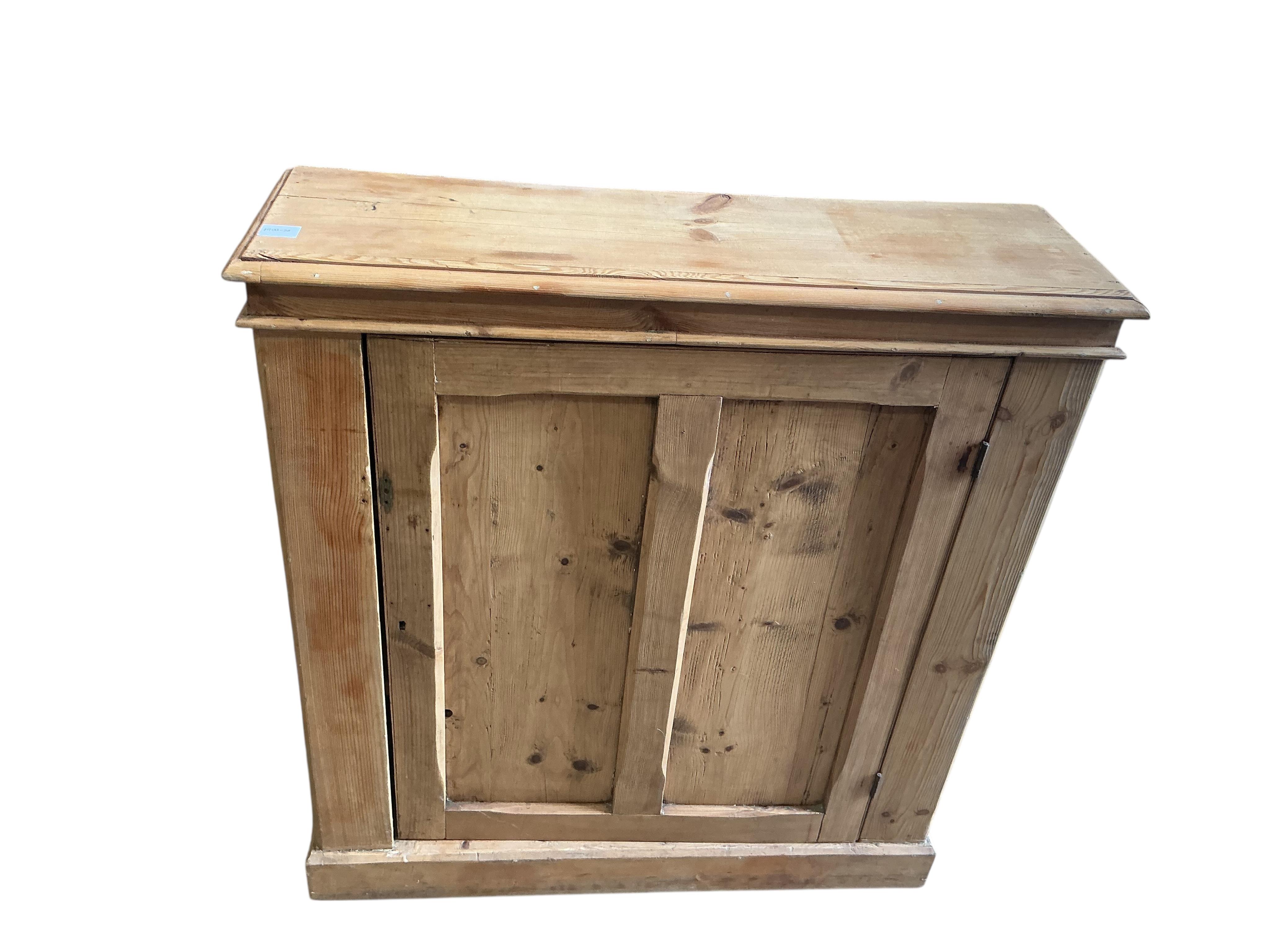 A Victorian pine single door side cabinet, width 100cm, depth 31cm, height 107cm